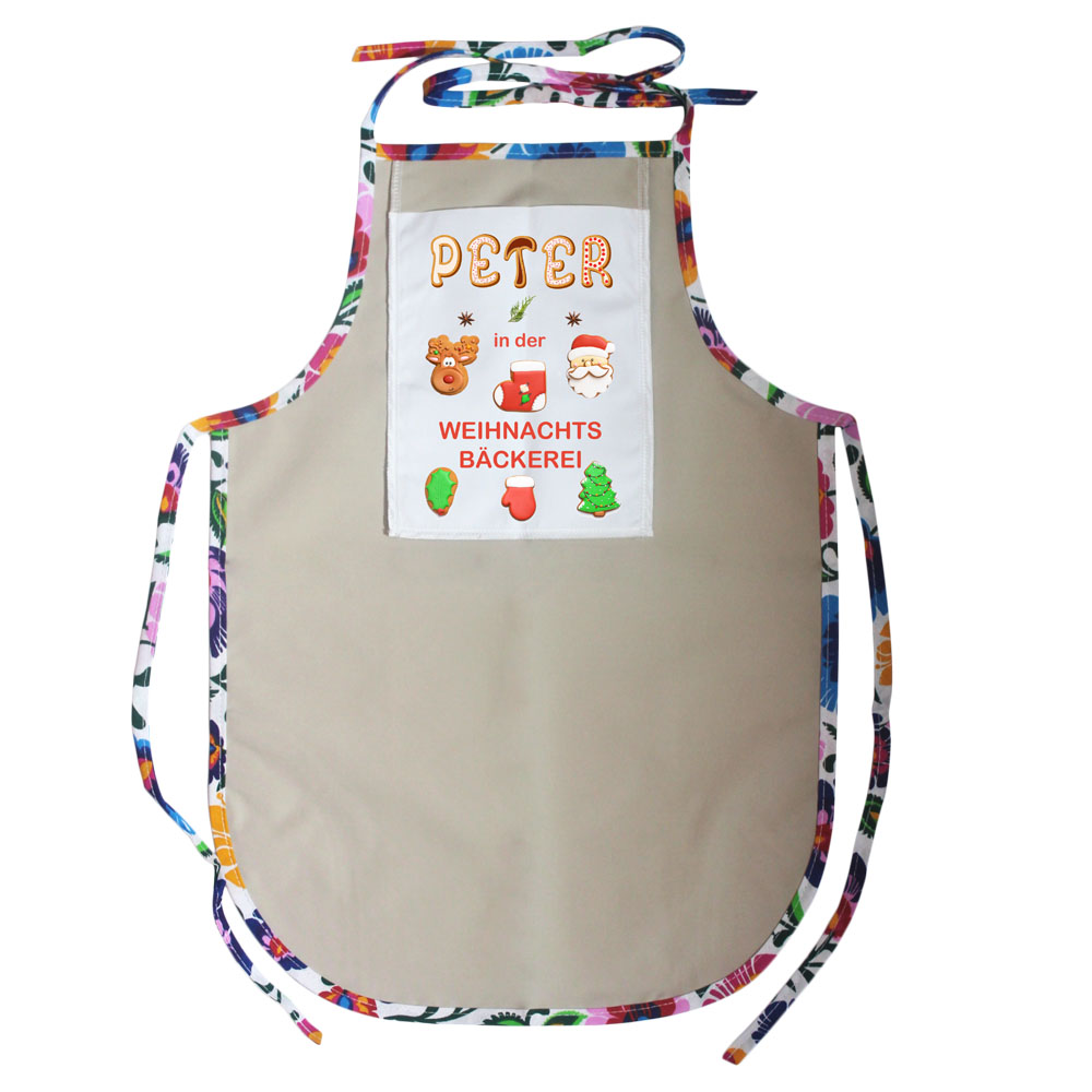 Kinderschürze mit Name Weihnachtsbäckerei auf bedruckter Tasche